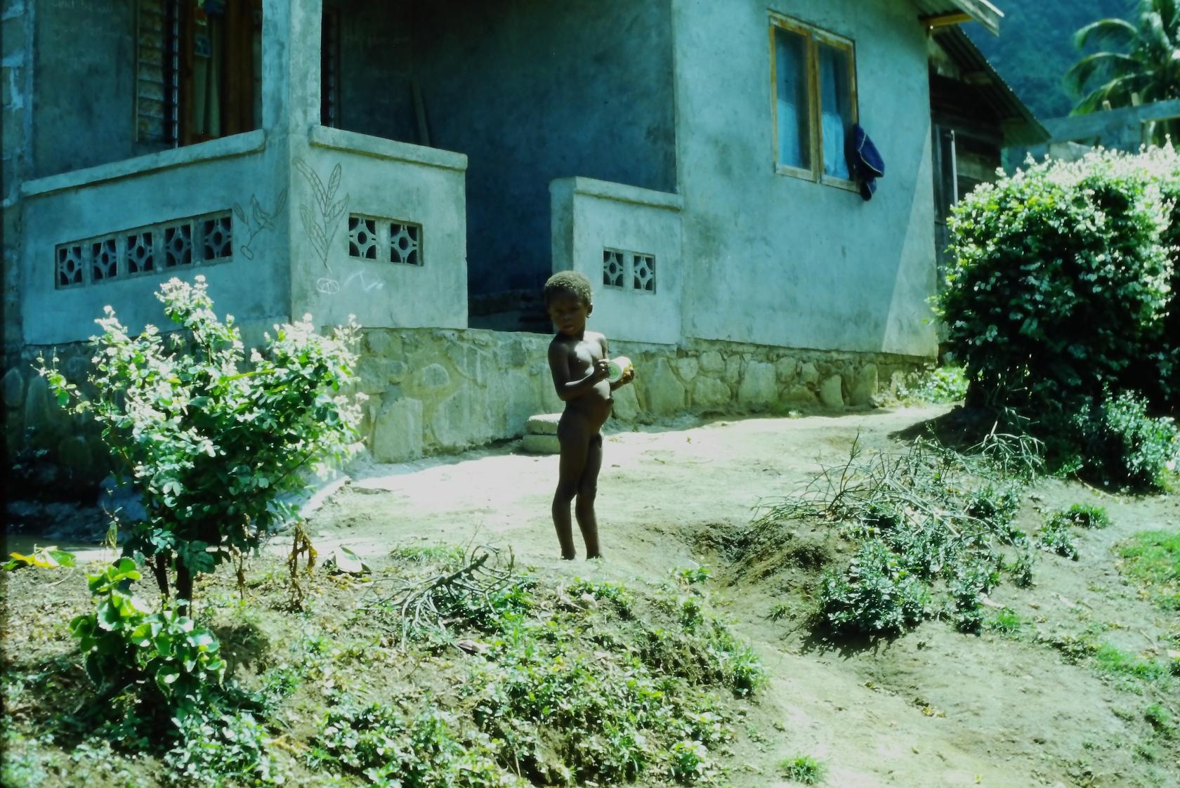 02-84 Boy outside his home in Fancy SVG.JPG